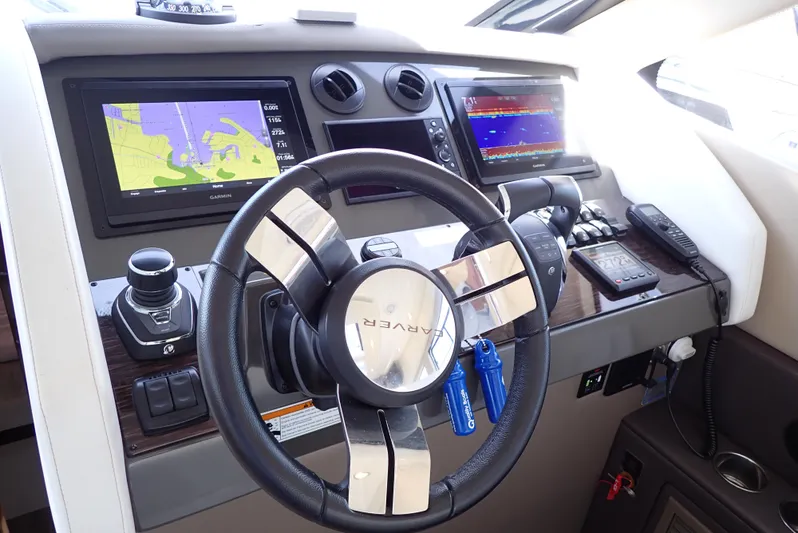  Yacht Photos Pics 2019 Carver C37 Coupe helm with navigation screens and controls.