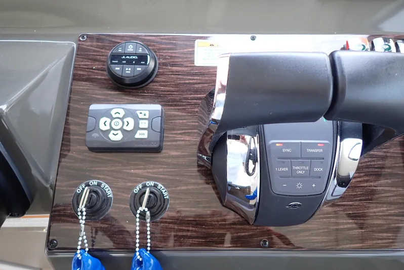  Yacht Photos Pics Control panel of 2019 Carver C37 Coupe with steering and electronic controls.