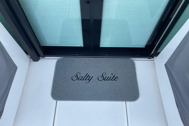 Salty Suite Yacht Photos Pics Doormat with "Salty Suite" on 2023 Tiara Yachts C44 Coupe.