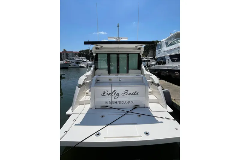 Salty Suite Yacht Photos Pics 2023 Tiara Yachts C44 Coupe docked at Hilton Head Island, SC marina.