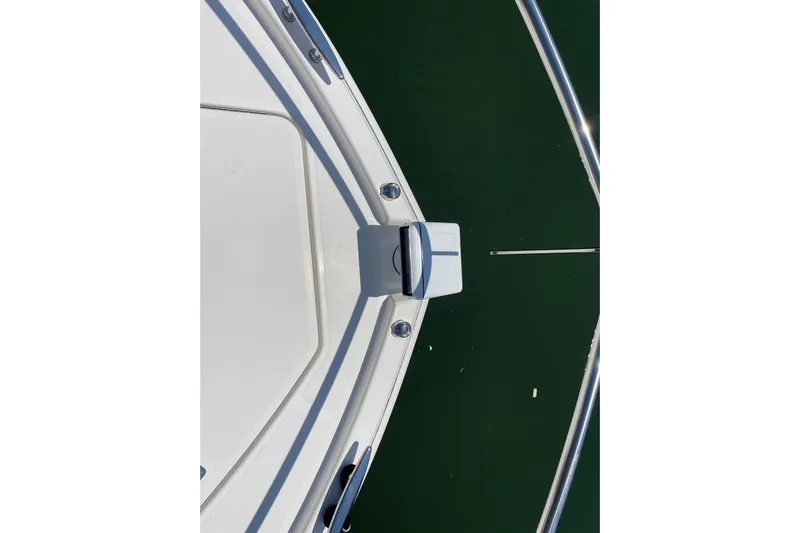 Salty Suite Yacht Photos Pics Bow view of 2023 Tiara Yachts C44 Coupe on water.