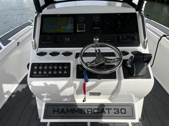 Hull 106 Yacht Photos Pics 2025 Hammer Yachts HammerCat 30 helm with modern controls and navigation system.