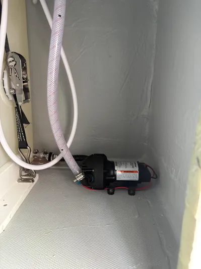 Hull 106 Yacht Photos Pics Interior view of 2025 Hammer Yachts HammerCat 30, showcasing a pump and hose system.