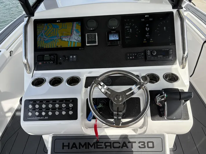 Hull 106 Yacht Photos Pics Helm of 2025 Hammer Yachts HammerCat 30 with advanced navigation and control systems.