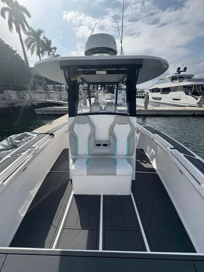 Hull 106 Yacht Photos Pics 2025 Hammer Yachts HammerCat 30 at marina, sleek design, modern seating, and spacious deck.