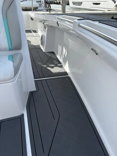 Hull 106 Yacht Photos Pics 2025 Hammer Yachts HammerCat 30 interior with sleek design and modern flooring.