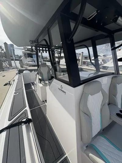 Hull 106 Yacht Photos Pics 2025 Hammer Yachts HammerCat 30, sleek design, docked at marina, modern interior.