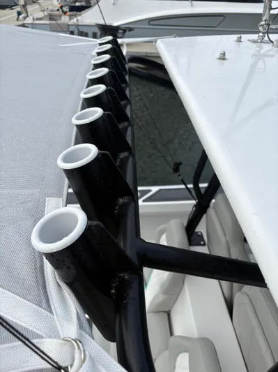 Hull 106 Yacht Photos Pics Rod holders on 2025 Hammer Yachts HammerCat 30, docked at marina.