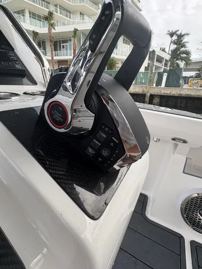Hull 106 Yacht Photos Pics 2025 Hammer Yachts HammerCat 30 throttle control on sleek boat dashboard.