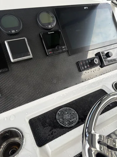 Hull 106 Yacht Photos Pics 2025 Hammer Yachts HammerCat 30 dashboard with modern navigation instruments and controls.