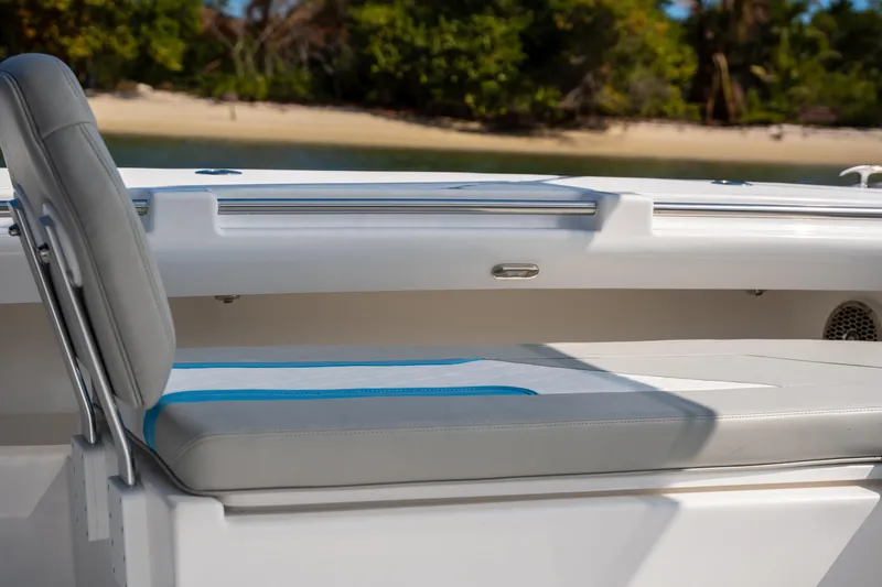 Hull 106 Yacht Photos Pics 2025 Hammer Yachts HammerCat 30 interior seating with beach view.