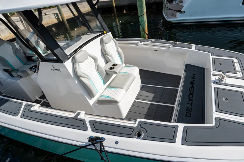 Hull 106 Yacht Photos Pics 2025 Hammer Yachts HammerCat 30 with sleek seating and modern design.