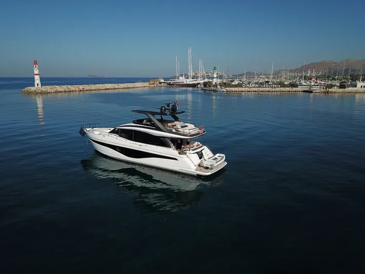  Yacht Photos Pics Luxury yacht Princess Y72 2022 in harbor on a sunny day.