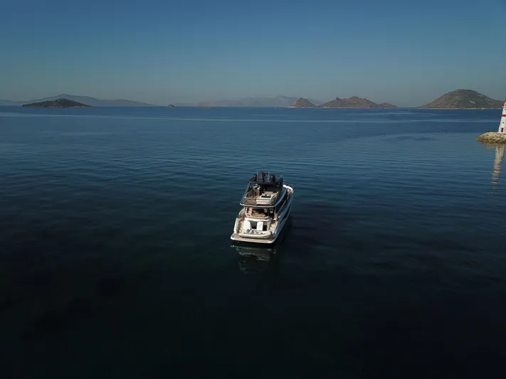  Yacht Photos Pics 2022 Princess Y72 luxury yacht on calm sea.