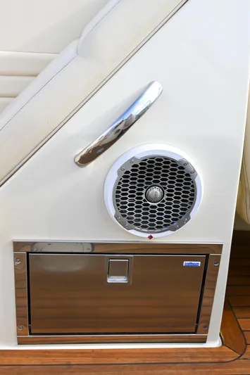  Yacht Photos Pics 2013 Chris-Craft Launch 32 boat interior speaker and storage compartment.