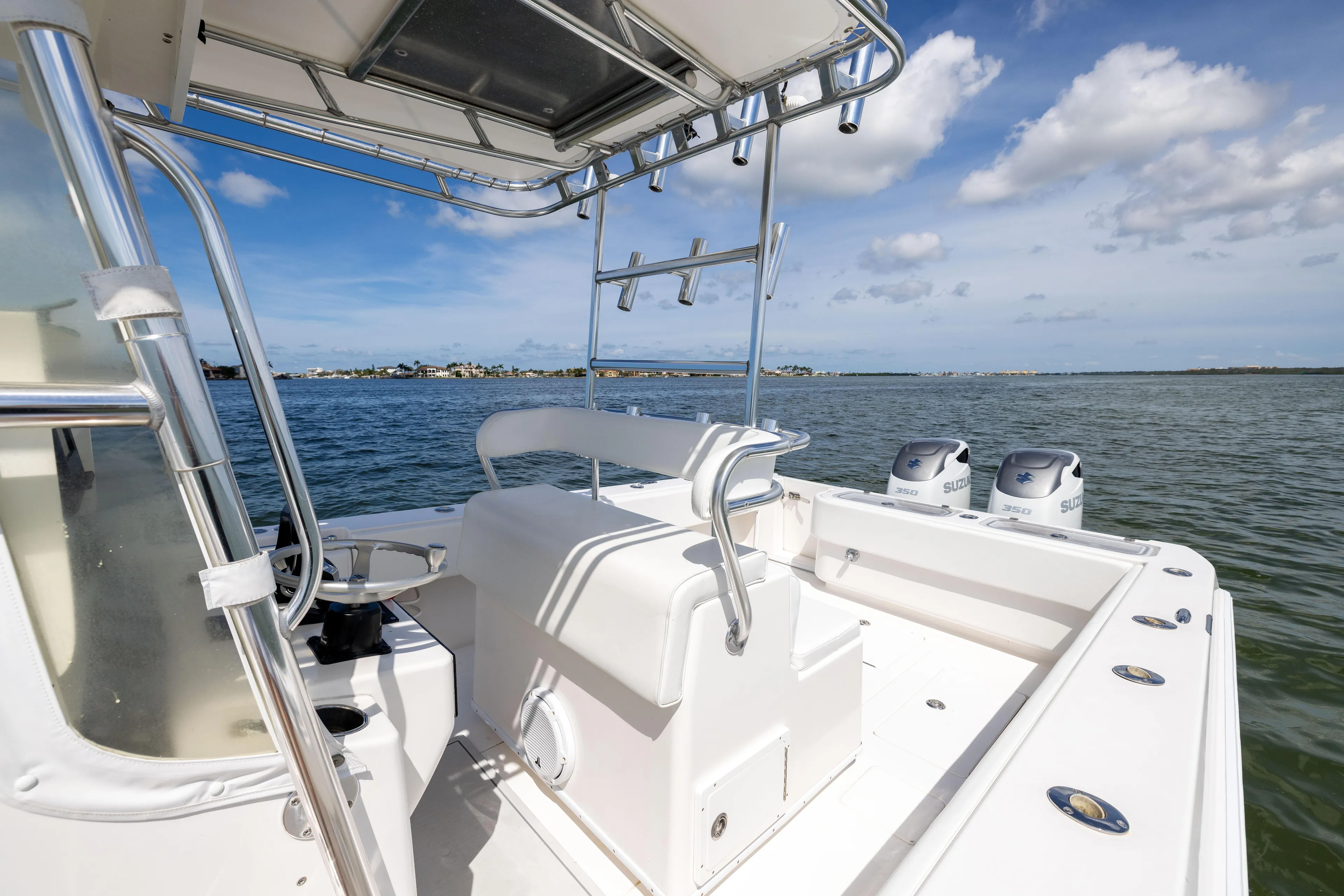  Yacht Photos Pics 2008 Contender 31 Open boat on water, featuring dual engines and spacious deck.