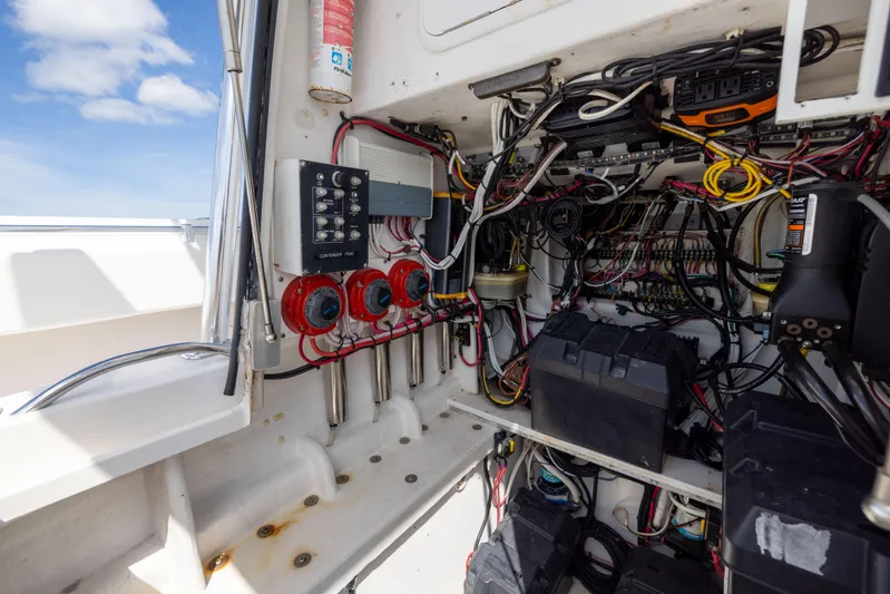  Yacht Photos Pics Electrical system of a 2008 Contender 31 Open boat, showcasing wiring and components.