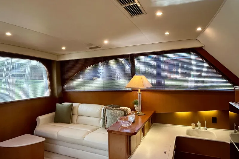 Next Yacht Photos Pics Luxurious interior of a 1999 Post 42 Convertible yacht with elegant furnishings.