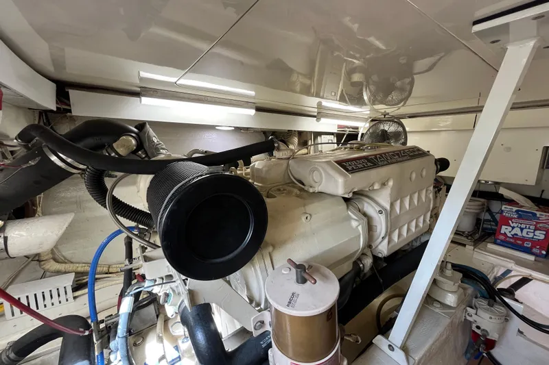 Next Yacht Photos Pics Engine room of a 1999 Post 42 Convertible boat with Volvo Penta engine.