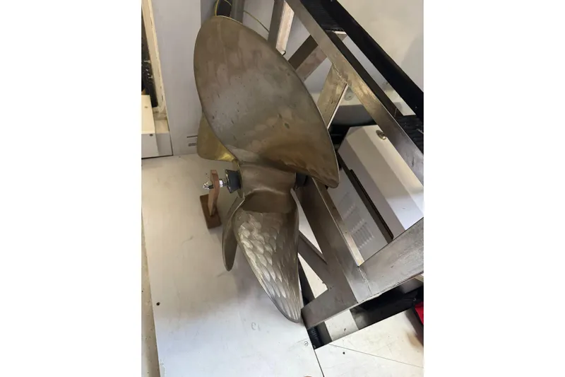 Boa Sorte Yacht Photos Pics Propeller of 2017 Azimut Magellano 53 yacht, displayed indoors.