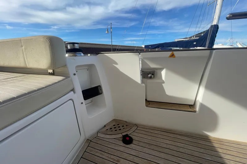 Boa Sorte Yacht Photos Pics Azimut Magellano 53 yacht deck, 2017 model, featuring seating and wooden flooring.