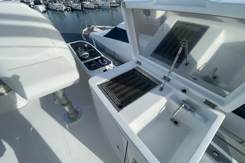 Boa Sorte Yacht Photos Pics Azimut Magellano 53 yacht deck with sink and grill, 2017 model.
