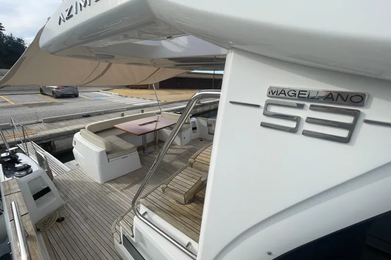 Boa Sorte Yacht Photos Pics 2017 Azimut Magellano 53 yacht with spacious deck and seating area.