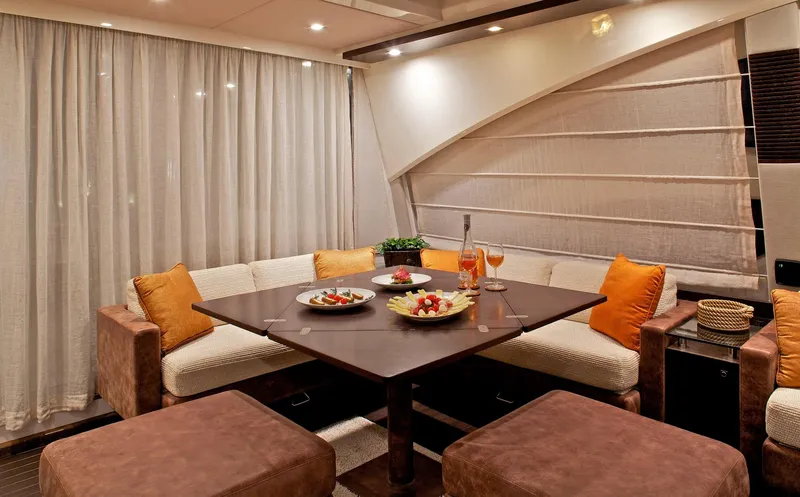  Yacht Photos Pics Luxurious interior of 2008 Azimut 86S yacht with elegant dining area and plush seating.