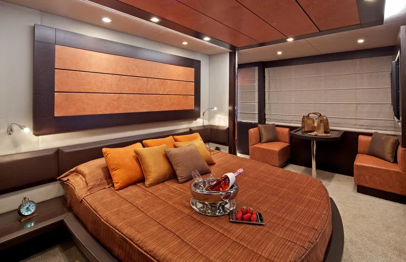  Yacht Photos Pics Luxurious bedroom interior of 2008 Azimut 86S yacht with elegant decor and modern furnishings.