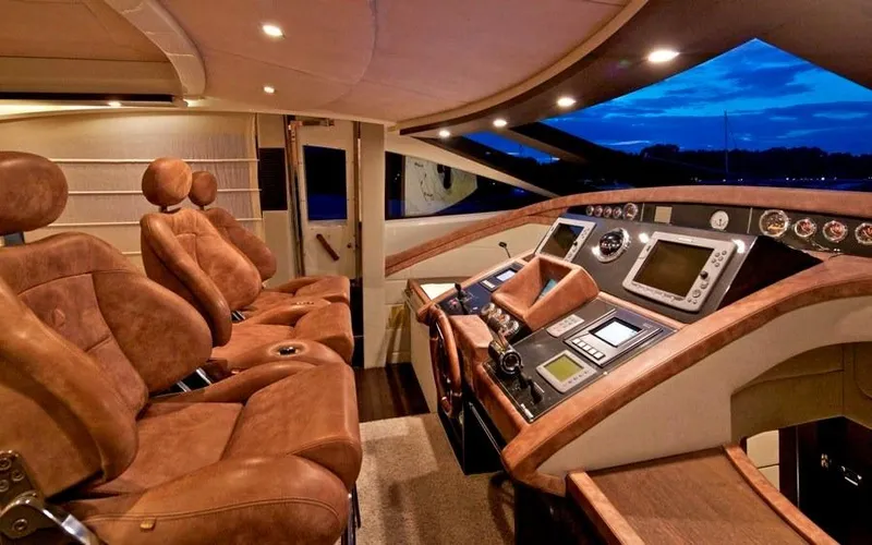  Yacht Photos Pics Luxurious interior of 2008 Azimut 86S yacht with leather seating and advanced navigation controls.