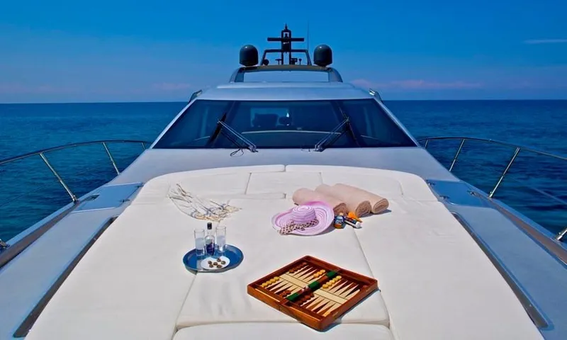  Yacht Photos Pics 2008 Azimut 86S yacht deck with backgammon set, towels, and ocean view.