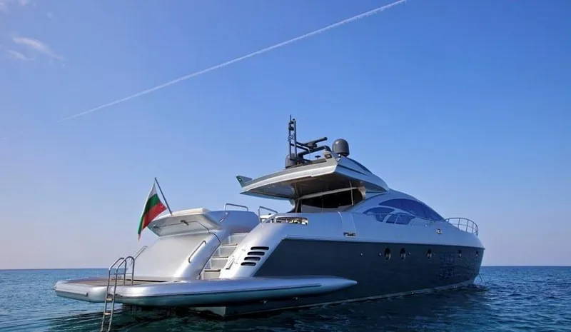  Yacht Photos Pics Luxury 2008 Azimut 86S yacht on calm sea under clear blue sky.