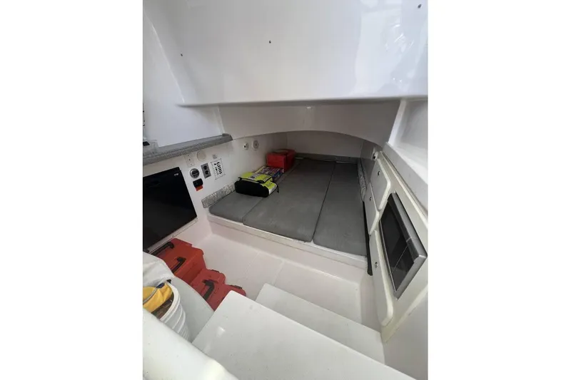  Yacht Photos Pics 2014 Stamas 390 Tarpon cabin interior with storage and seating area.