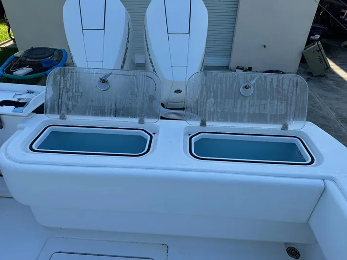  Yacht Photos Pics 2024 Contender 32 ST boat with dual livewells and outboard engines.