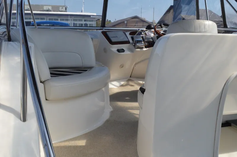 Alta Levica Yacht Photos Pics 2006 Meridian 368 Motoryacht interior with plush seating and modern helm controls.