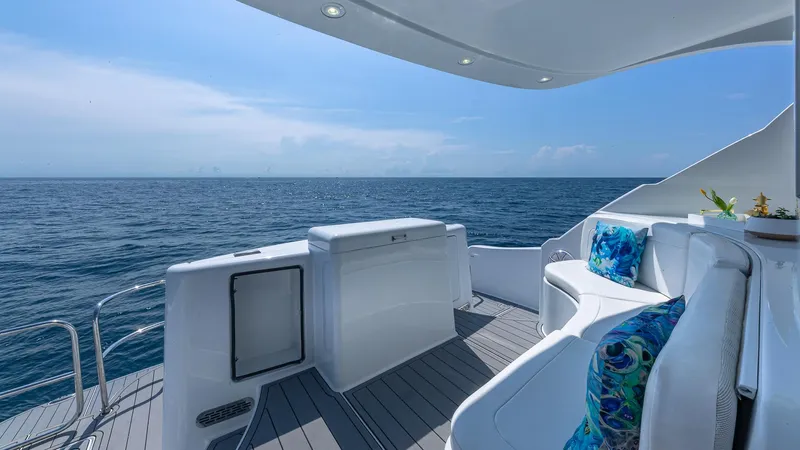  Yacht Photos Pics Luxurious 2010 Custom 650 Catamaran deck with ocean view and plush seating.