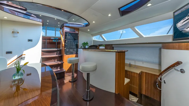  Yacht Photos Pics Luxurious interior of 2010 Custom 650 Catamaran with modern design and panoramic windows.
