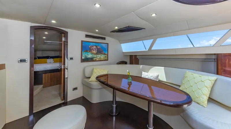  Yacht Photos Pics Luxurious interior of 2010 Custom 650 Catamaran with elegant seating and modern decor.