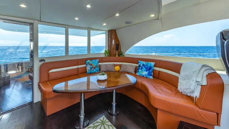  Yacht Photos Pics Luxurious interior of 2010 Custom 650 Catamaran with ocean view and cozy seating area.