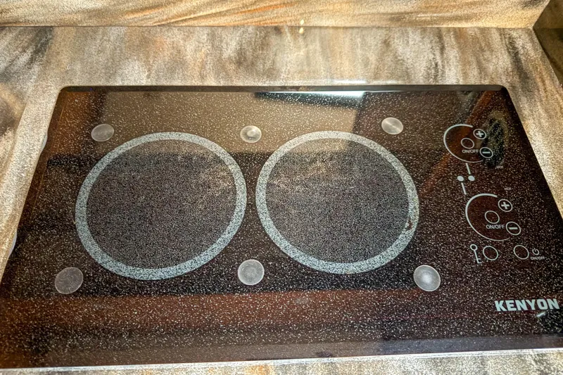  Yacht Photos Pics Kenyon electric cooktop on 2016 Sea Ray Sundancer 510 yacht kitchen counter.