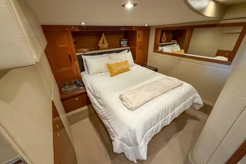  Yacht Photos Pics Luxurious cabin interior of 2016 Sea Ray Sundancer 510 yacht with cozy bedding.