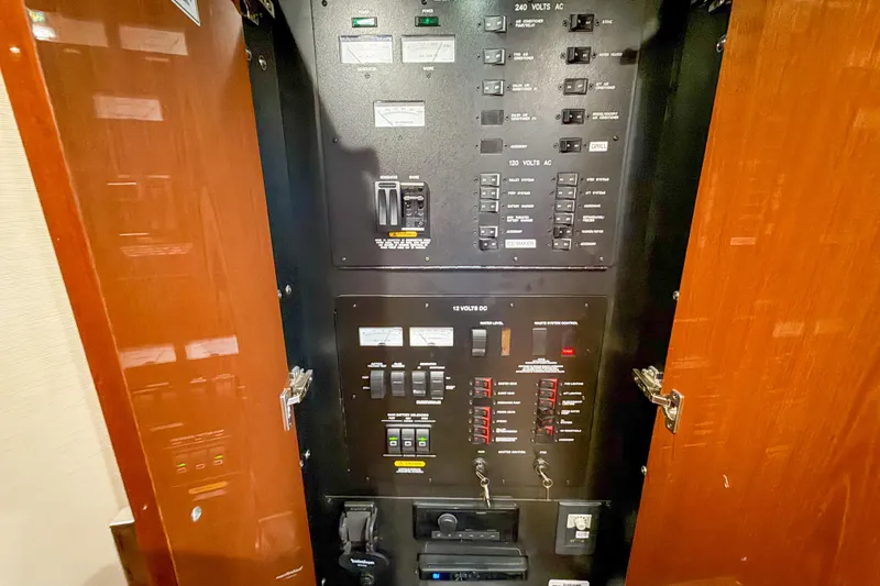  Yacht Photos Pics Electrical control panel inside 2016 Sea Ray Sundancer 510 yacht, featuring switches and circuit breakers.