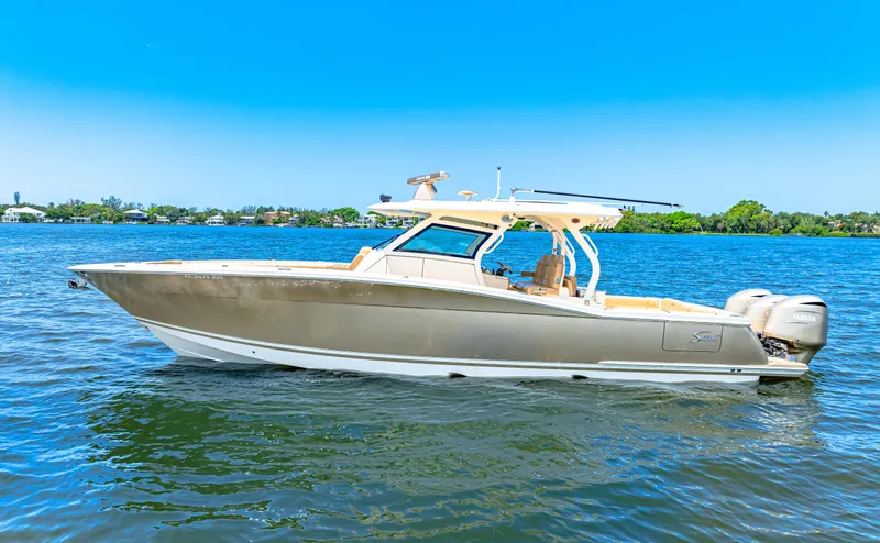  Yacht Photos Pics 2018 Scout 380 LXF boat cruising on a sunny day.