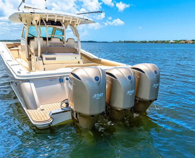  Yacht Photos Pics 2018 Scout 380 LXF boat with triple 350 horsepower engines on the water.