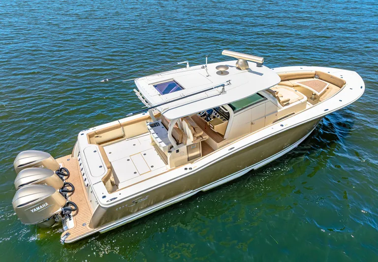  Yacht Photos Pics 2018 Scout 380 LXF boat with triple Yamaha engines on the water.