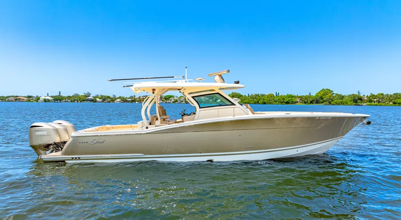  Yacht Photos Pics 2018 Scout 380 LXF boat on calm water.