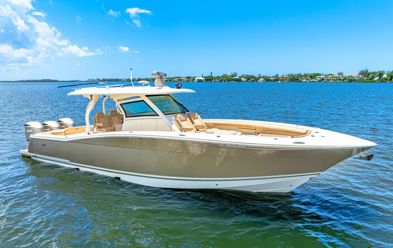  Yacht Photos Pics 2018 Scout 380 LXF boat cruising on a sunny day.