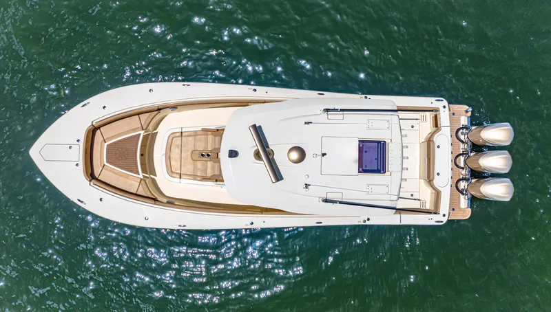  Yacht Photos Pics Aerial view of 2018 Scout 380 LXF boat on water.