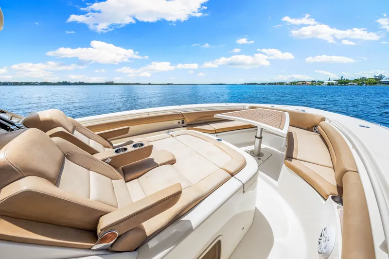  Yacht Photos Pics 2018 Scout 380 LXF boat interior with luxurious seating and ocean view.