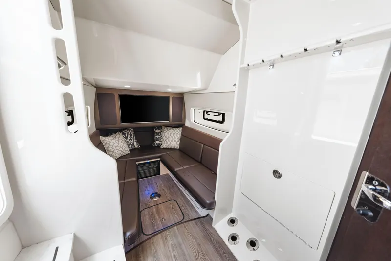  Yacht Photos Pics 2018 Scout 380 LXF cabin interior with leather seating and modern amenities.